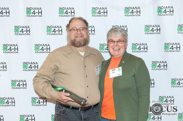 4-H volunteers receiving award