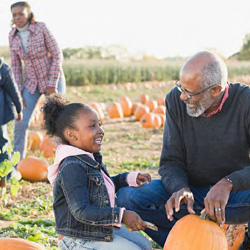 Family in pumpkin patch