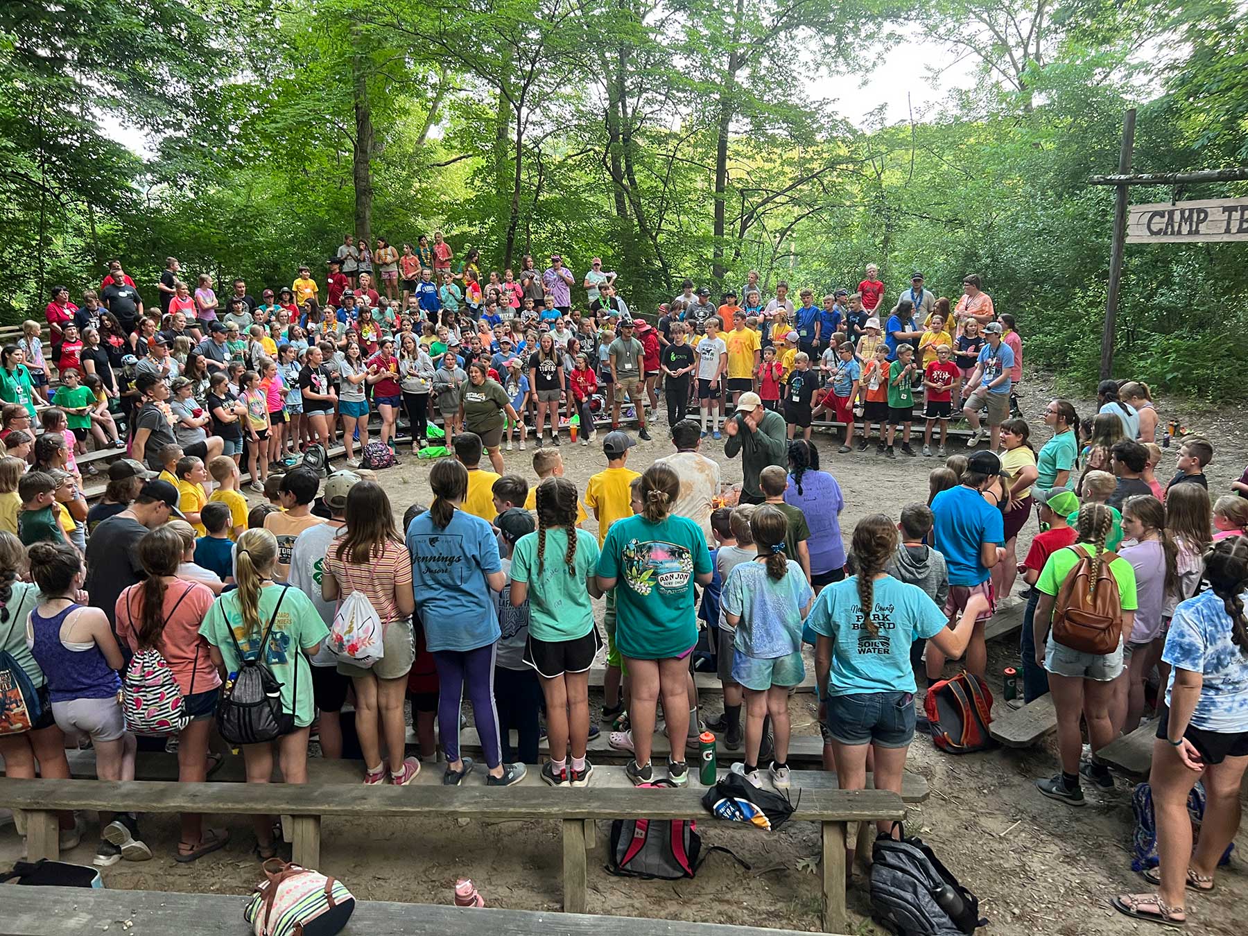 group of people around amphitheater