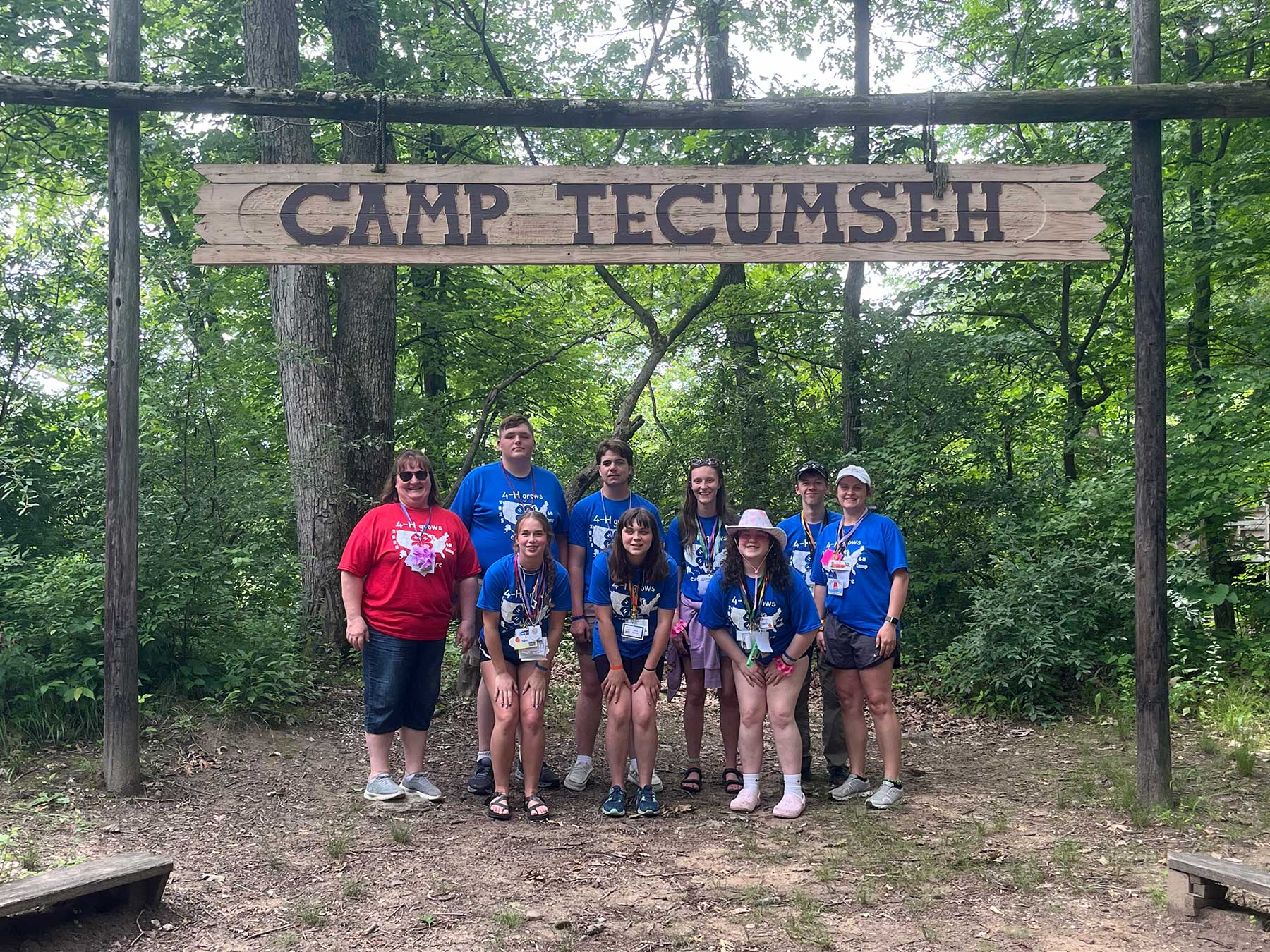 group of people under sign