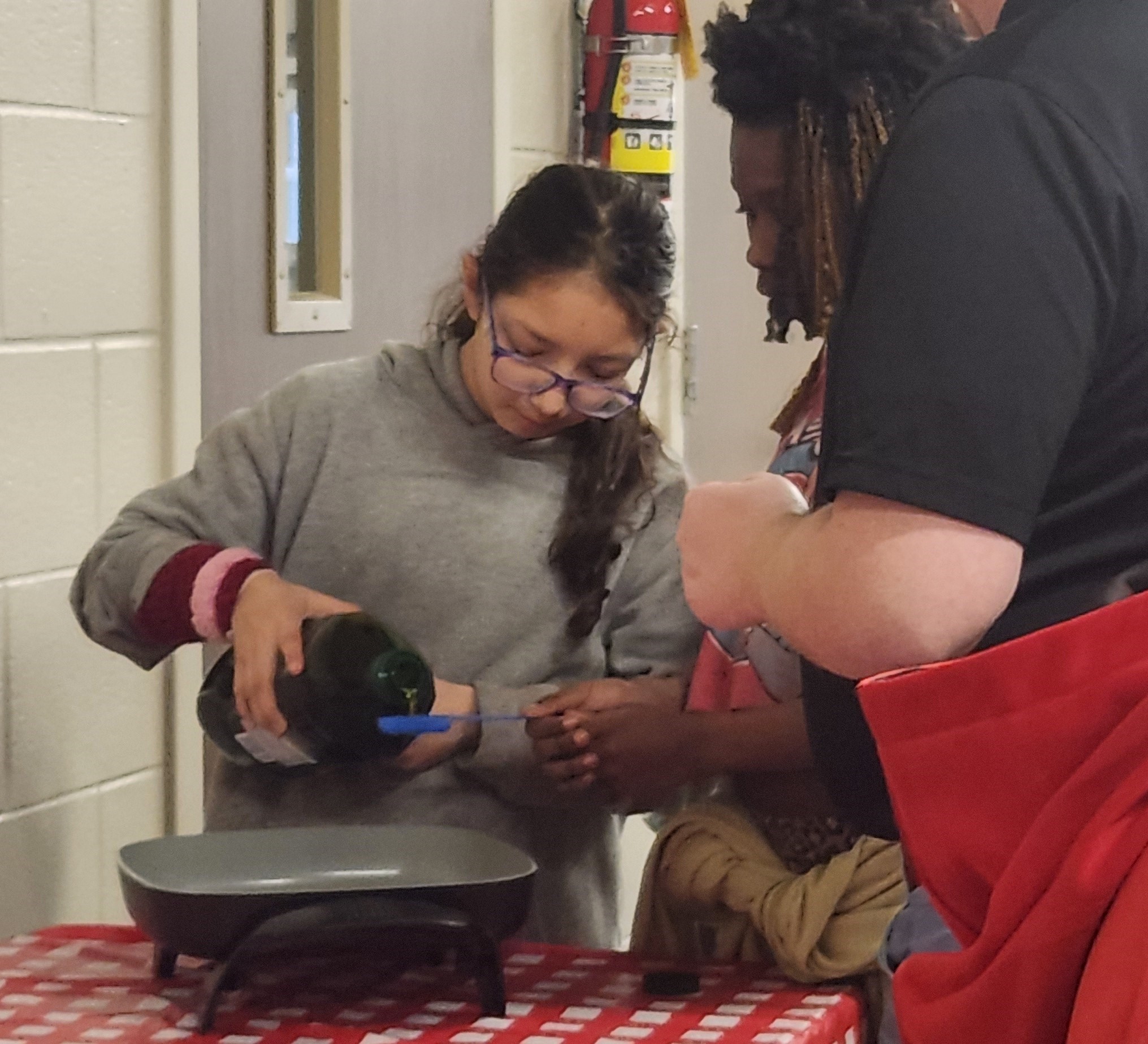 Students Measuring Cooking Oil