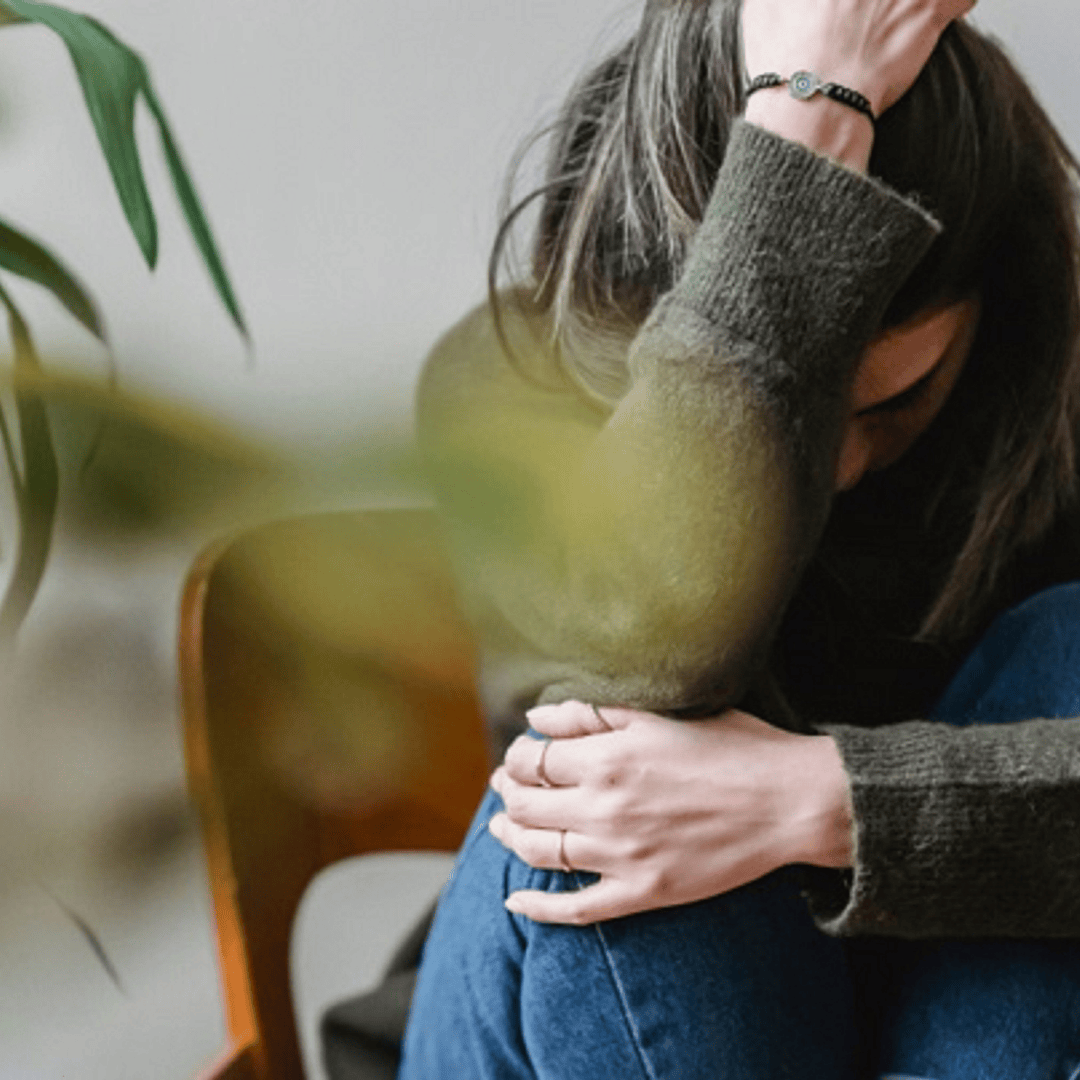 Woman sitting stressed out