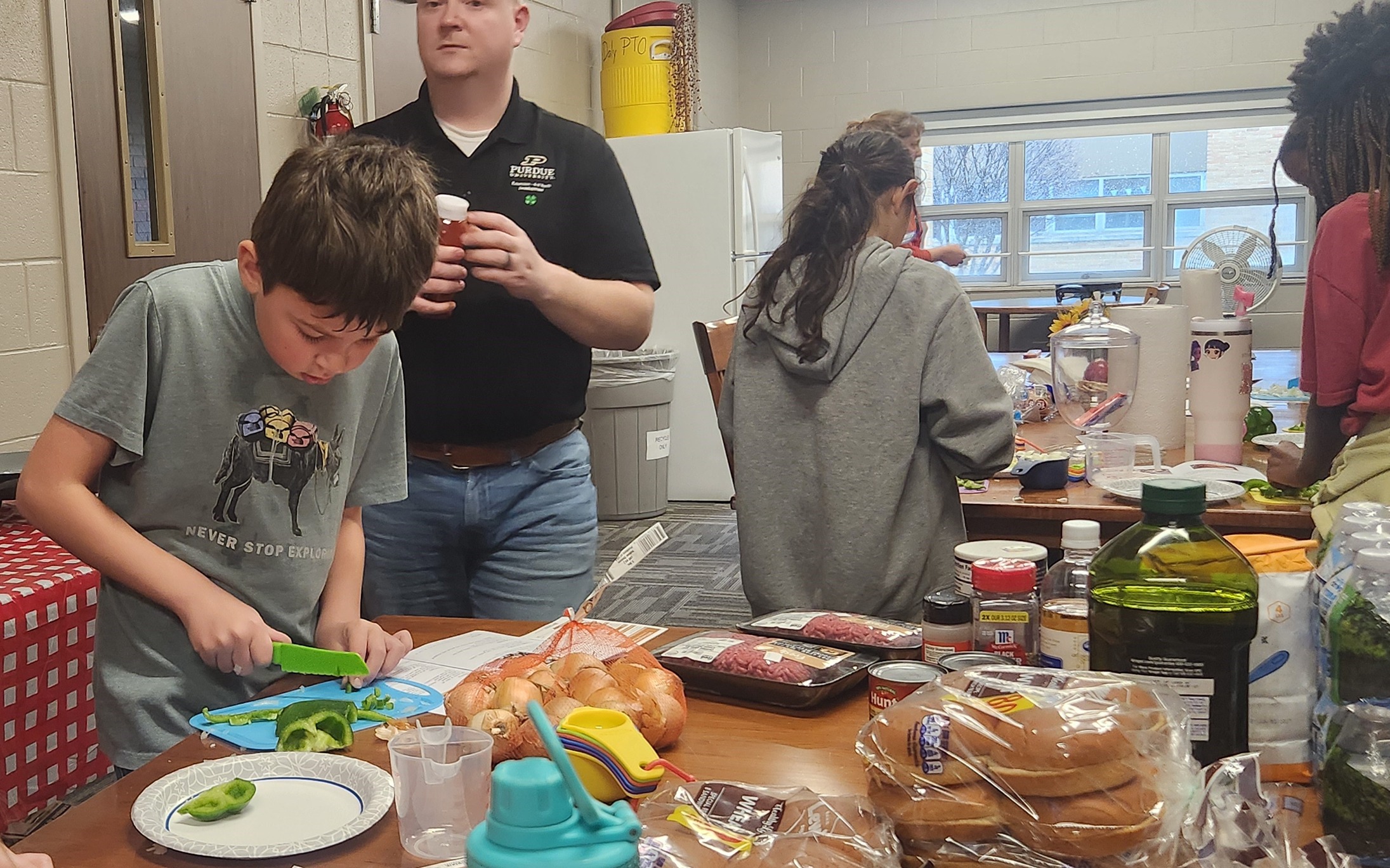 Student Chopping Peppers