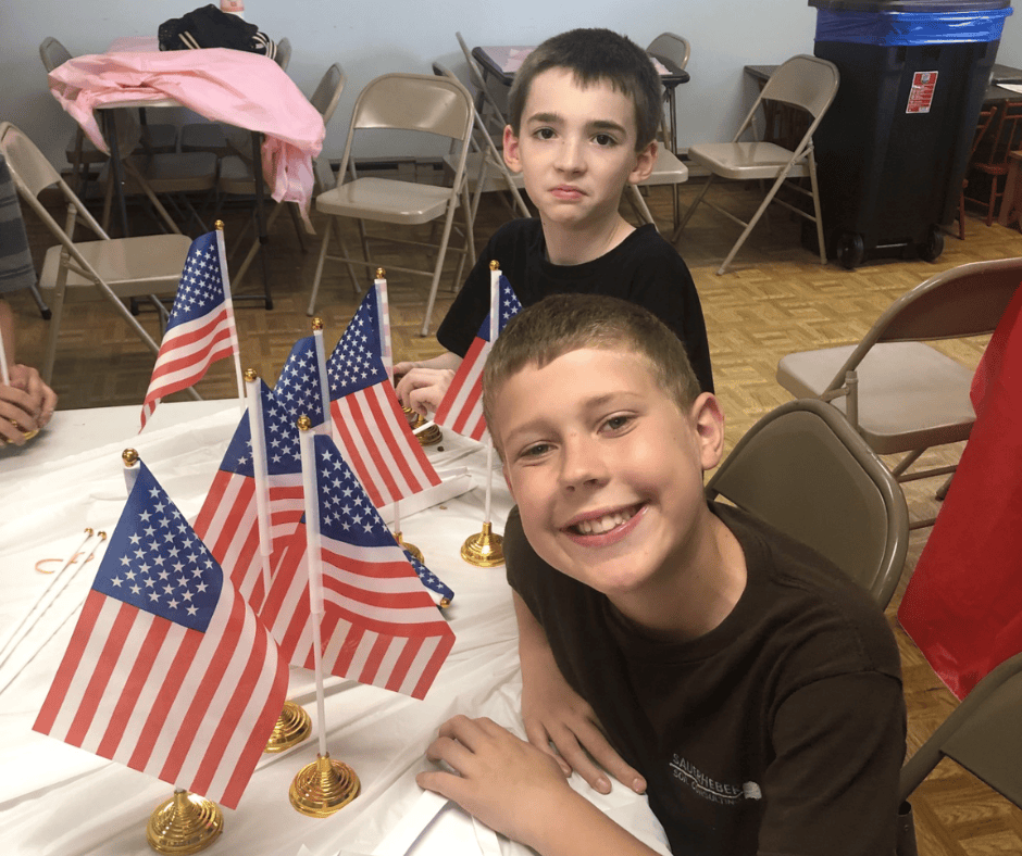 4-H member at a community service event