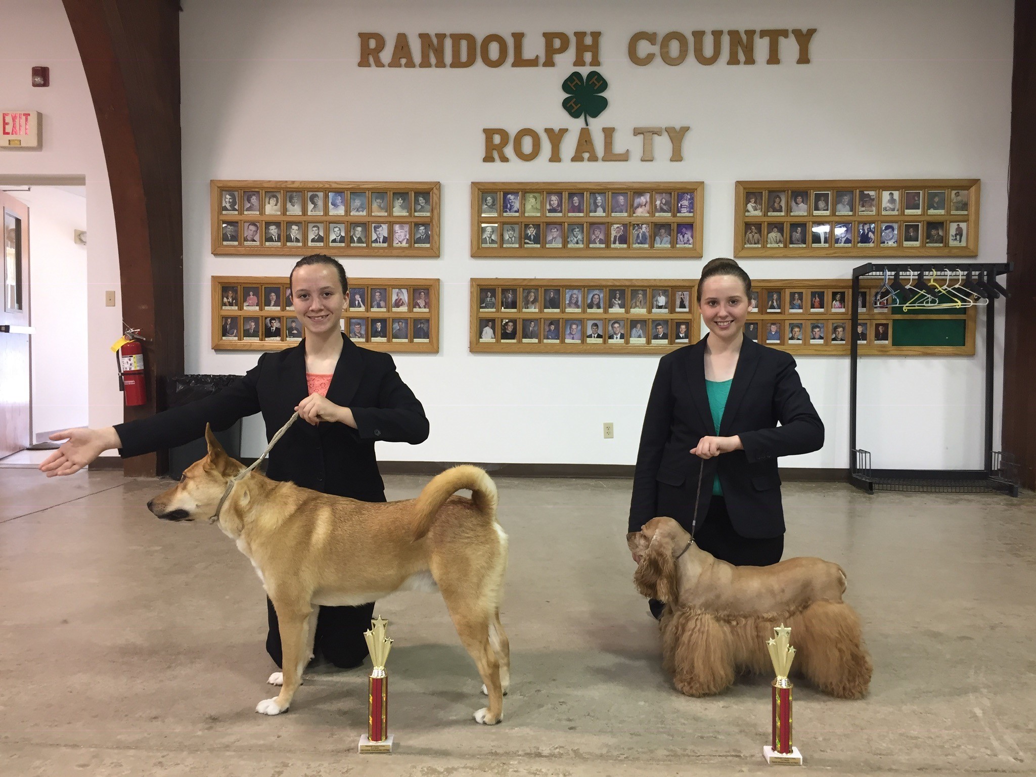 4-H Dog Club Members with they dogs after winning a competition.