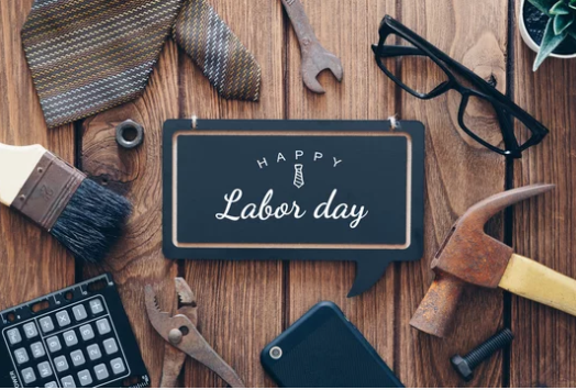 Happy Labor Day sign with tools around it