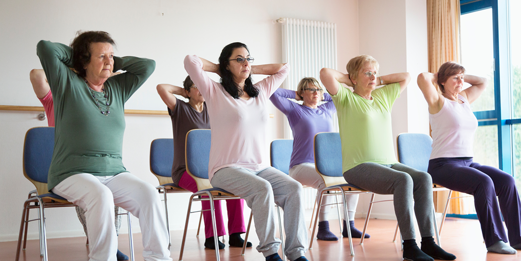 Seniors doing chair exercises
