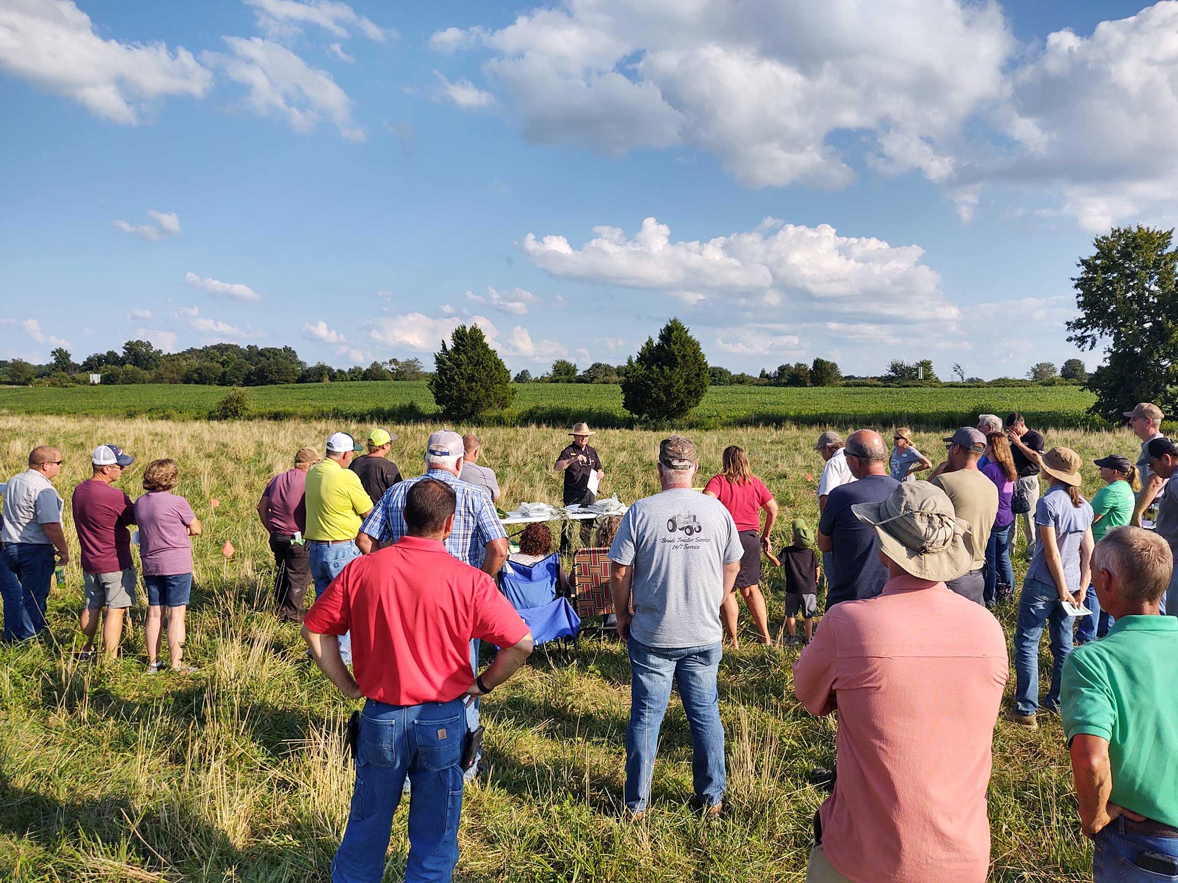 Participants listening to a forage presentation