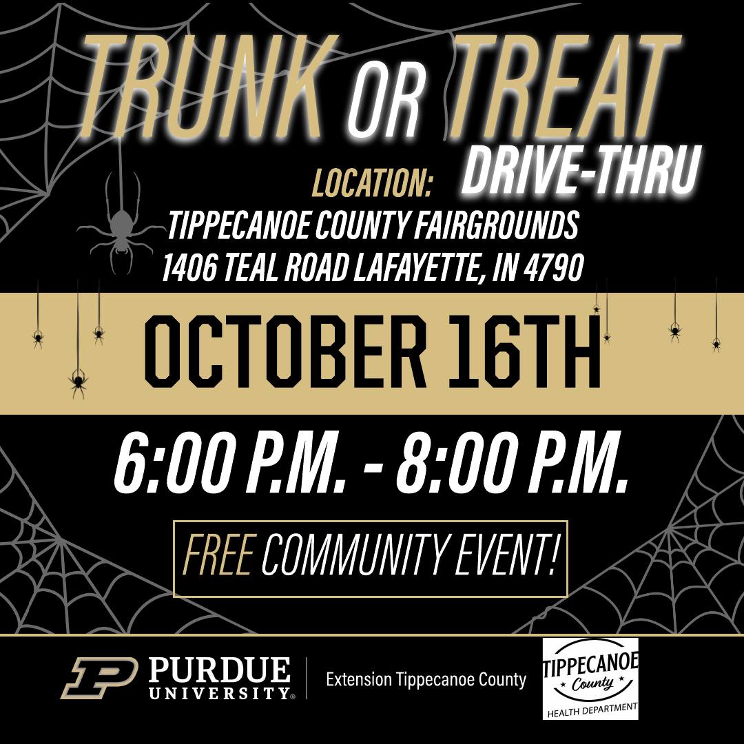Flyer for the Tippecanoe County Trunk or Treat Drive-Thru event. Text reads: ‘Trunk or Treat Drive-Thru. Location: Tippecanoe County Fairgrounds, 1406 Teal Road, Lafayette, IN 47909. October 16th, 6:00 p.m. – 8:00 p.m. Free community event!’ The flyer features spider webs and hanging spiders in black and gold Halloween-themed colors. Logos for Purdue University Extension Tippecanoe County and Tippecanoe County Health Department are shown at the bottom.