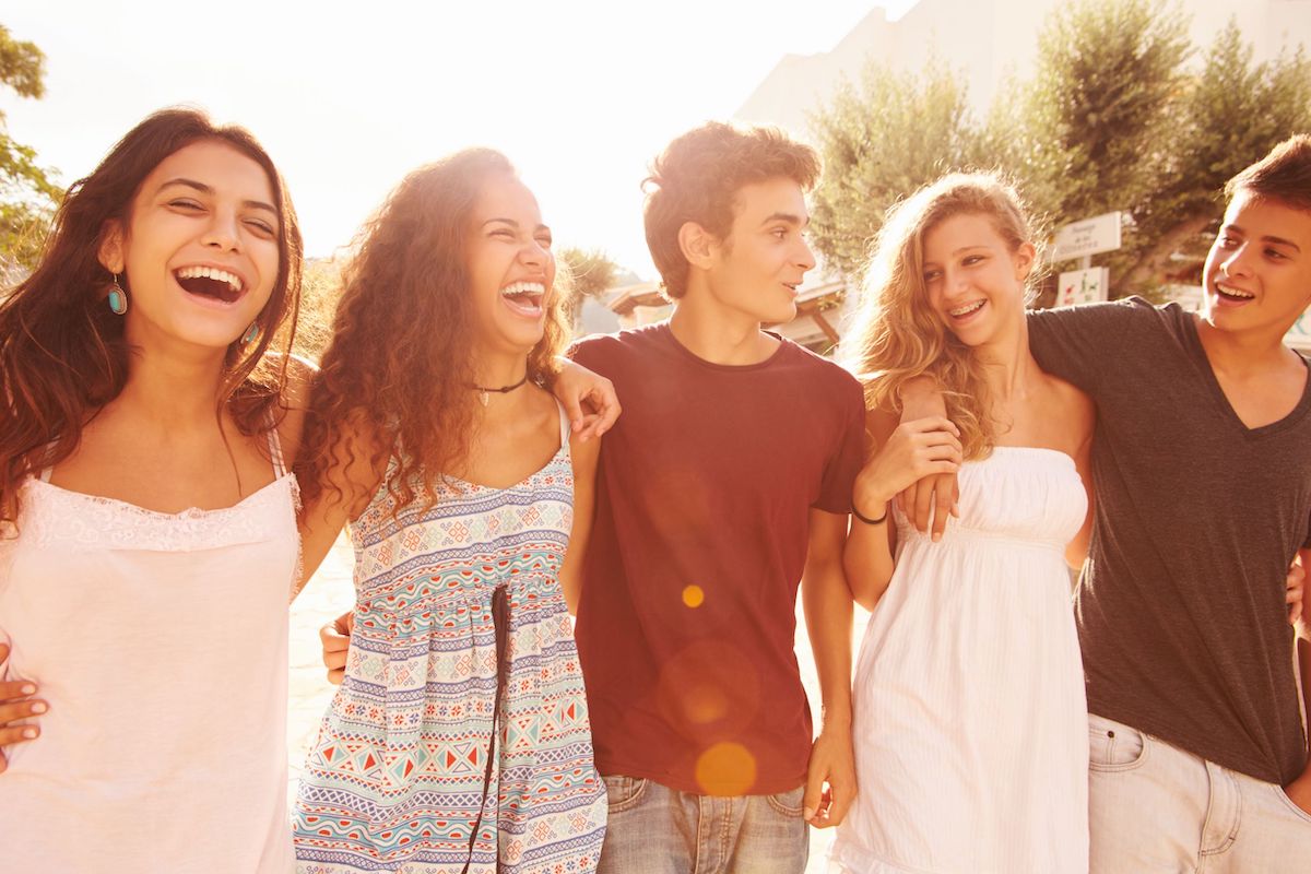 Teens smiling outdoors