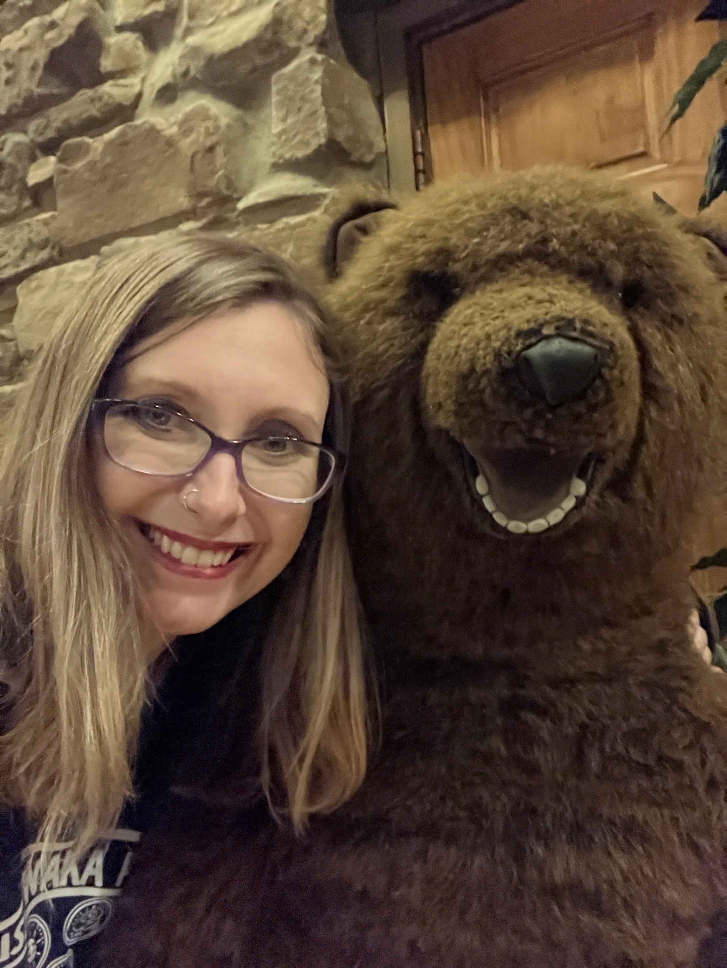 woman and stuffed bear