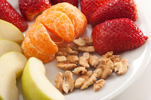 plate with vegetables and nuts