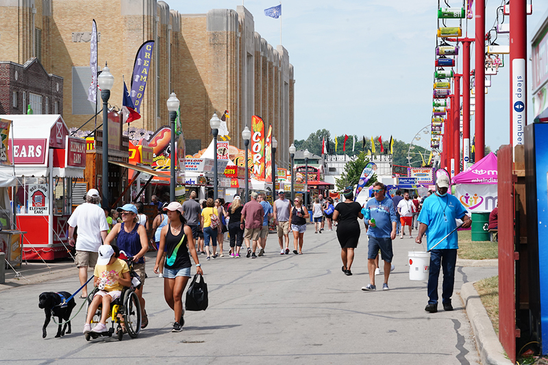Fairgoers browse all the Indiana State Fair midway has to offer