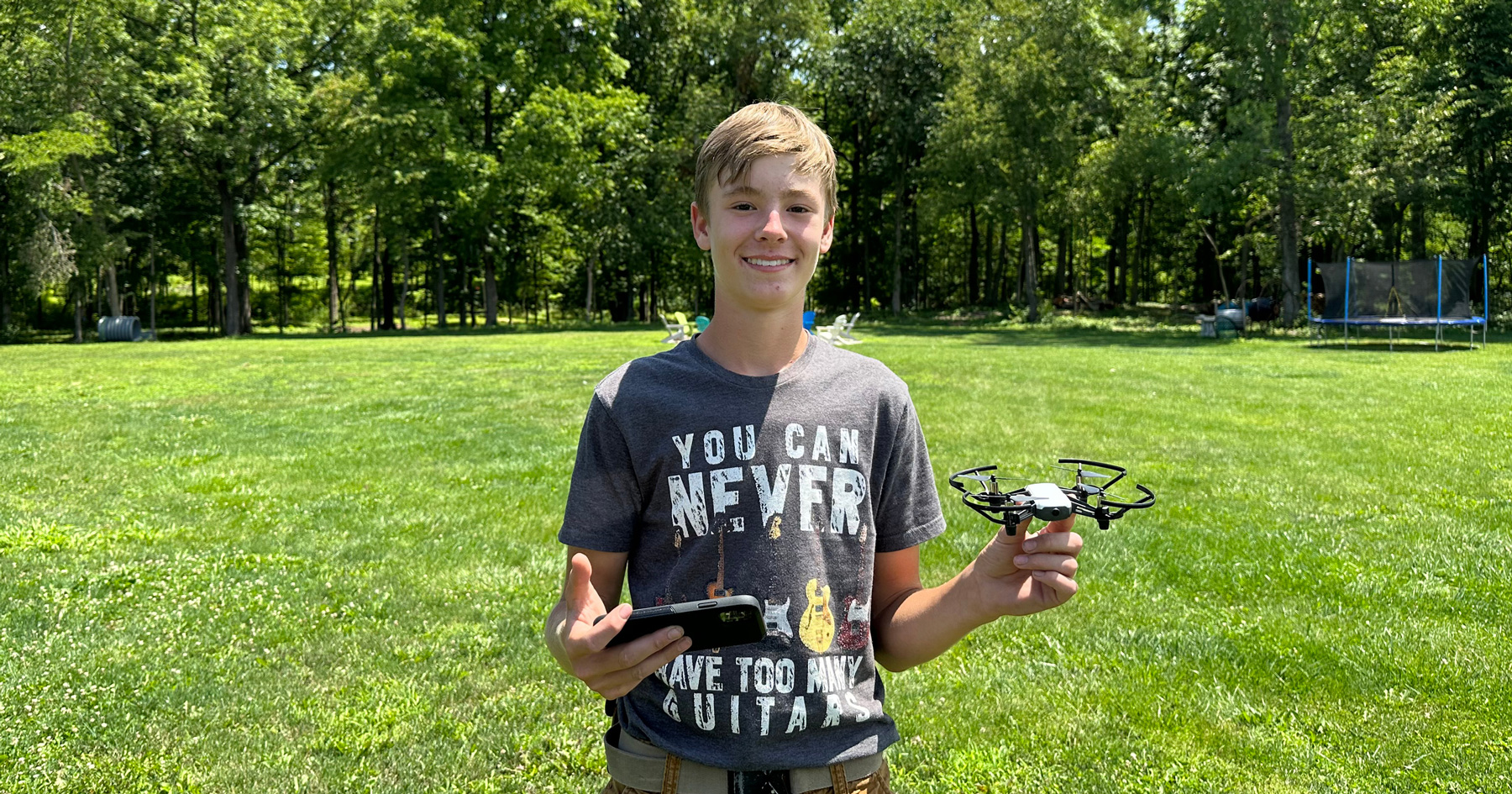 Today's Teens Lead the way, photo of teen holding a drone