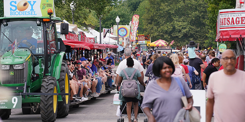 people walking on the street at the Indiana State Fair