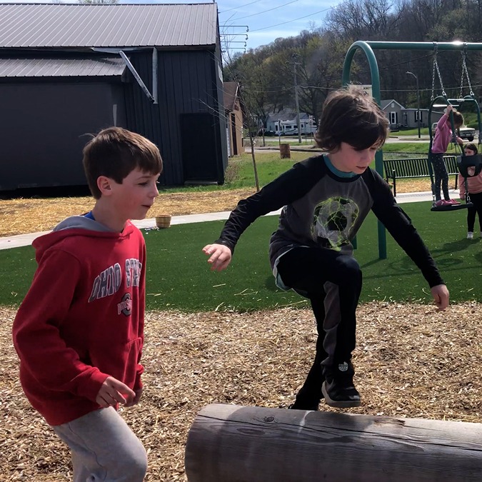 A young boy plays at the new park in Connersville, IN.
