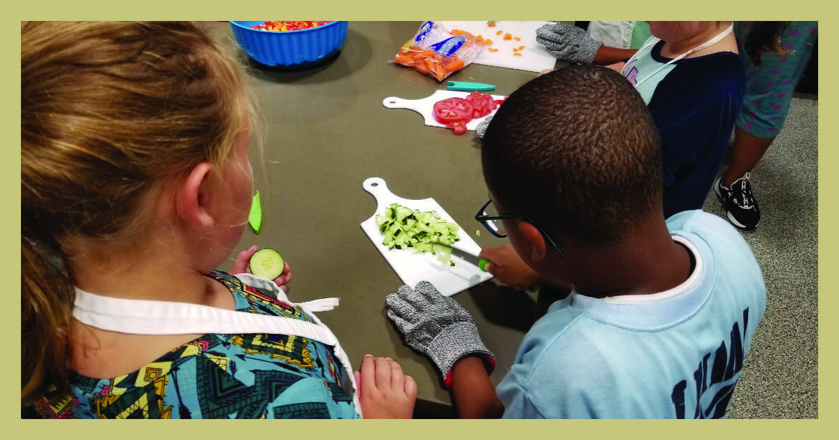 kids chopping vegetables