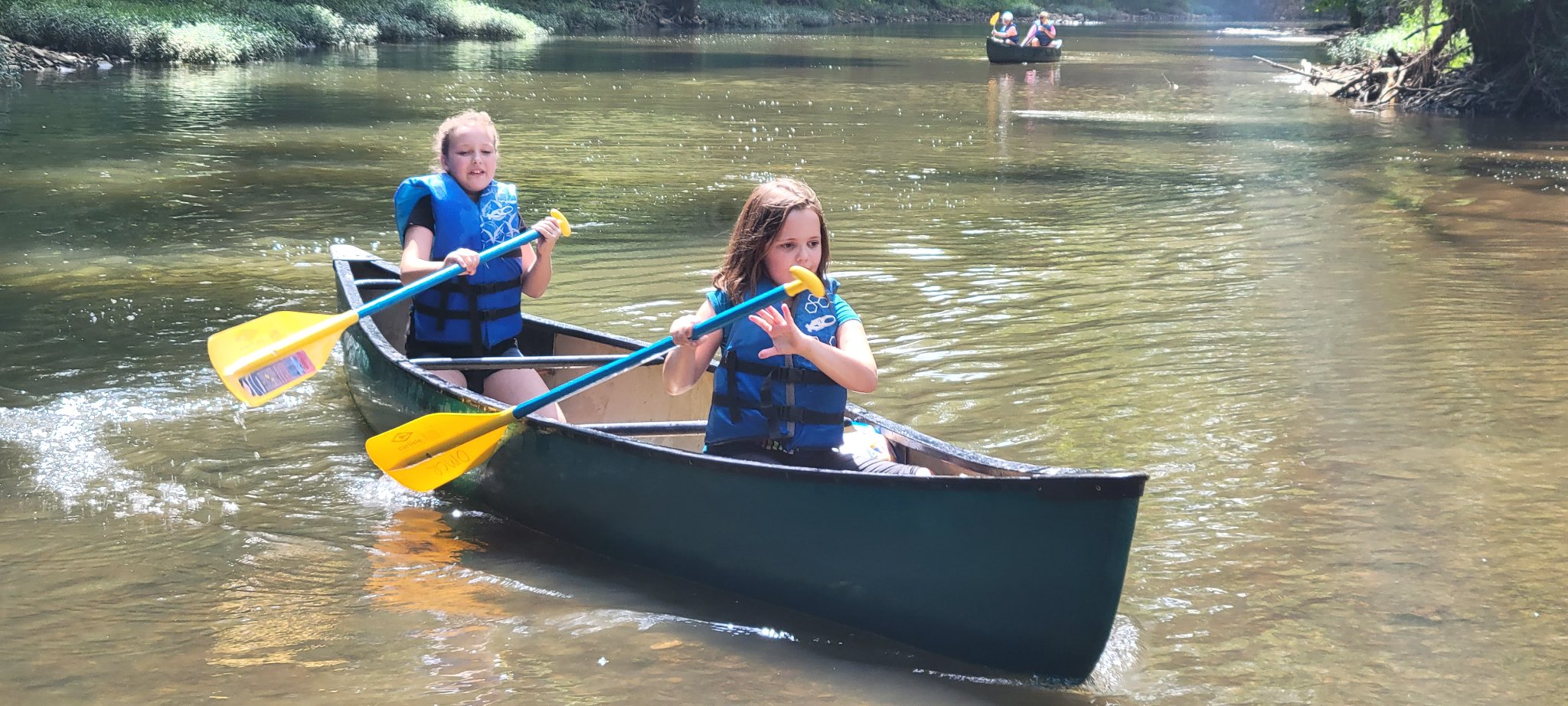 canoeing naturalist campers