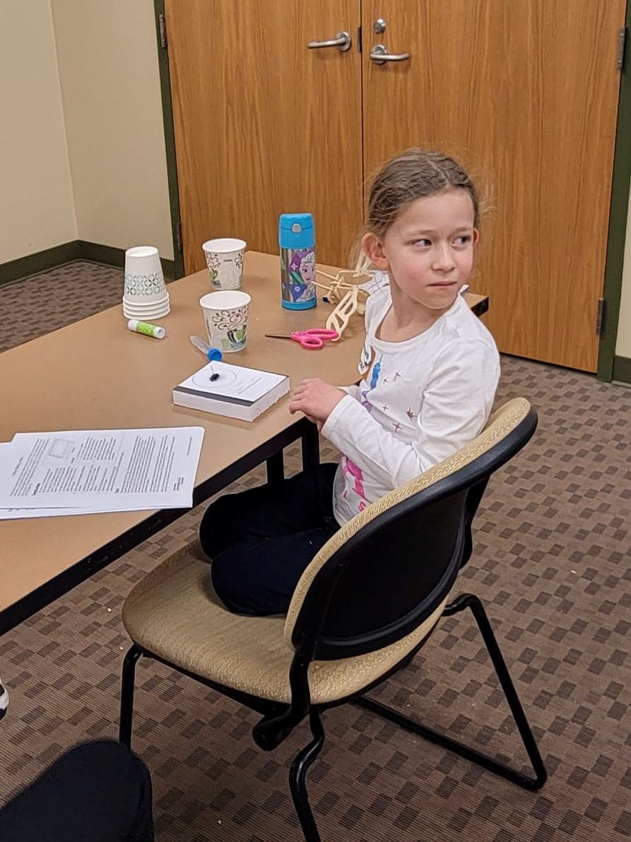 child at a table