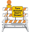 image of a trafic sing as barrier with message "Turn Around Don't Drown" 