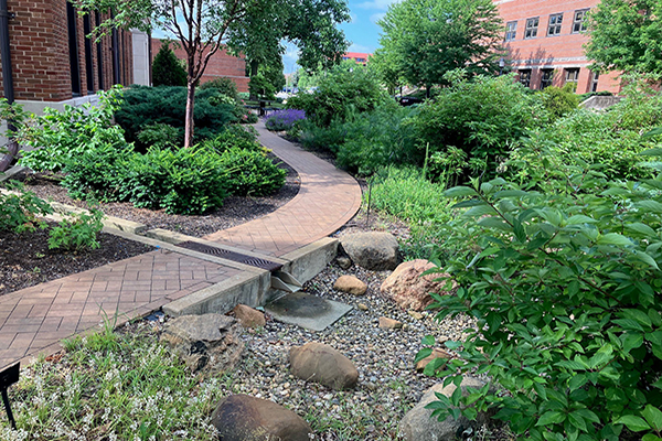 Raingarden project located at Purdue Horticulture building with landscaping to help with water drainage.