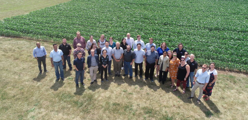 Image of group of researchers on a field