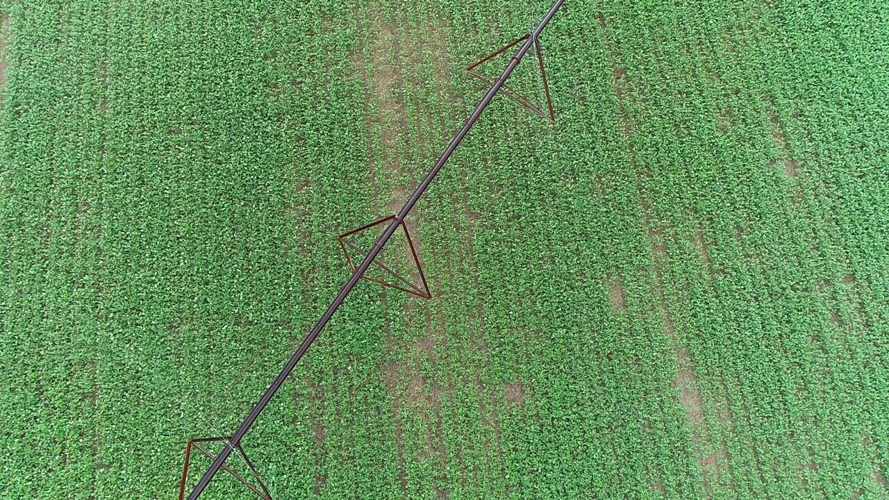 Image of a irrigation farm equipment on a field 