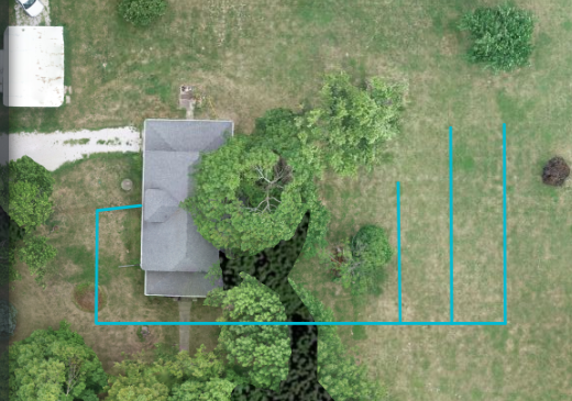 Image of a house with existing drainage line of the septic drain